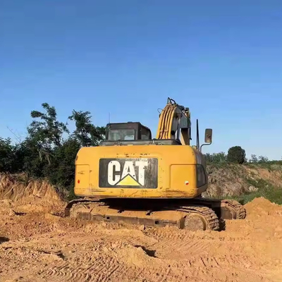 中古水力建築機械 CAT 323 1m3のバケツ容量を持つ掘削機
